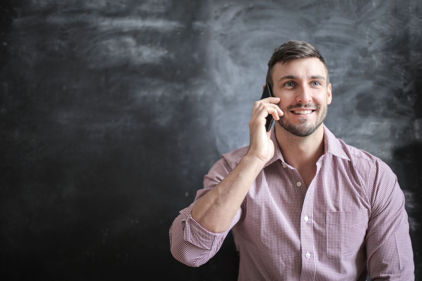 A man talking on the phone.